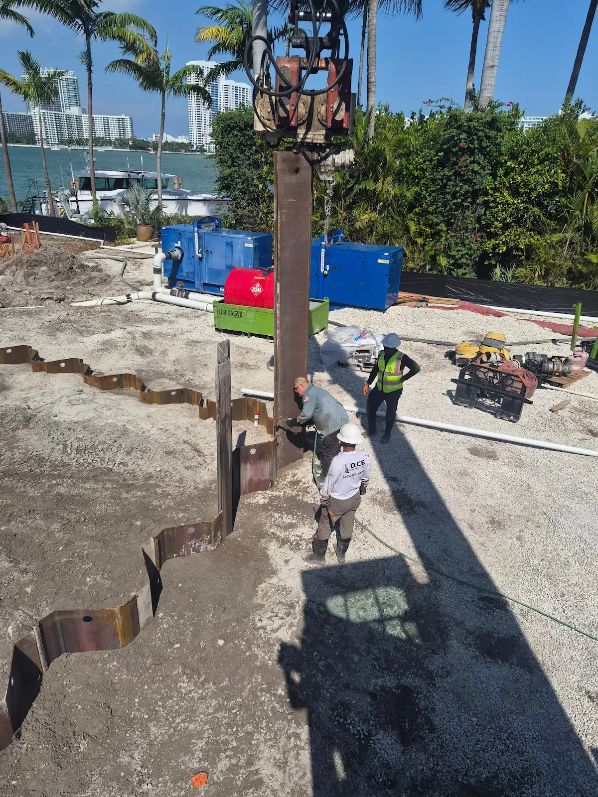 DCE crew installing auger cast piles on site