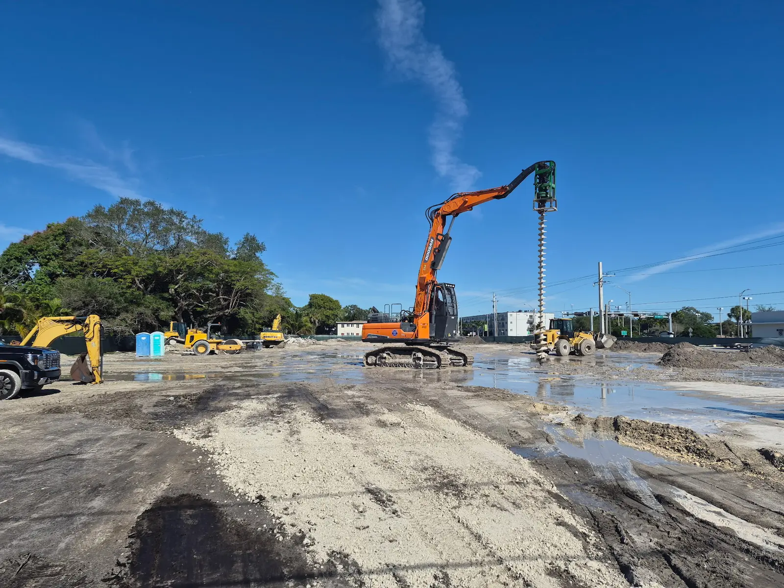 Ground improvement equipment across a prepared job site