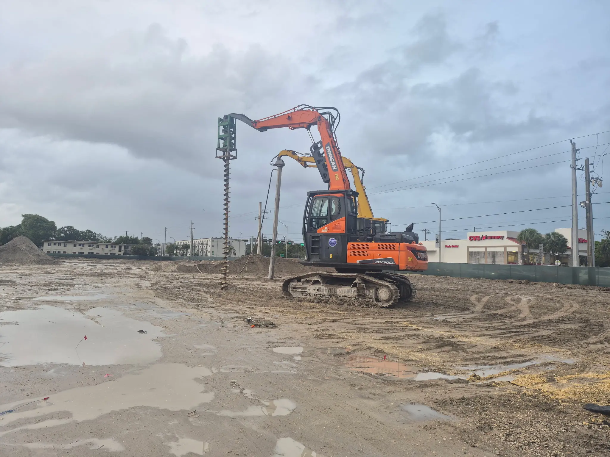 Excavator working across the commercial site